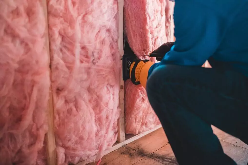All loft insulation, even, on walls is carefully removed to reduce dust creation